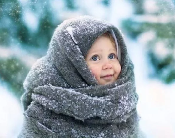 child in warm clothes
